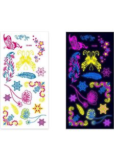 Ark med Fluorescerende Sommerfugl, Blomster, Snøfnugg og Andre Tatoveringer (UV Fake Tattoo)