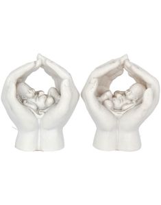 Shelter - 2 stk Små Figurer af Vuggende Hænder 7 cm